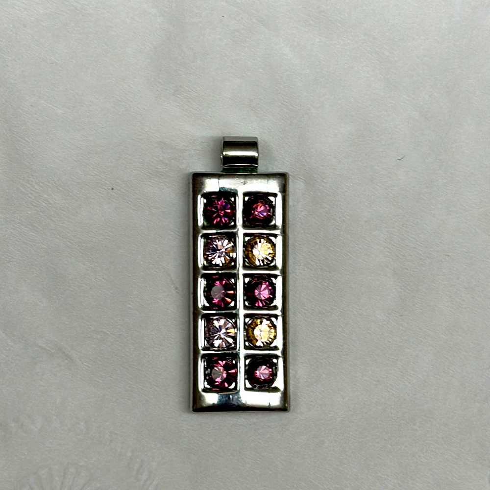 Dark, purple, light, pink, and silver pendant.